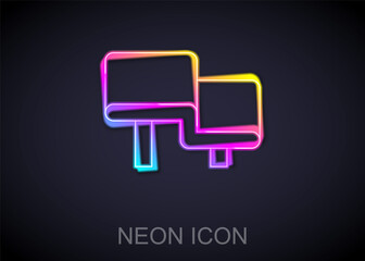Glowing neon line Sauna wood bench icon isolated on black background. Vector.