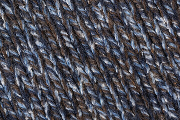 melange background. Knitted textured background of woolen threads of different colors and patterns