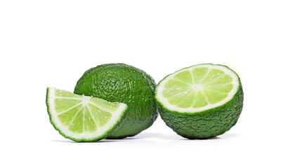 Pair of lime fruits isolated on white ground.