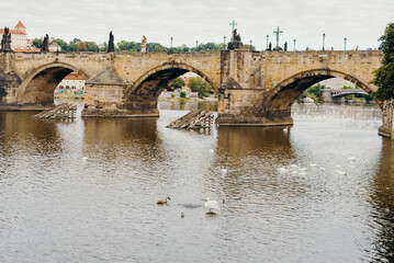 Vltava river in Prague. Karluv most or Charles bridge