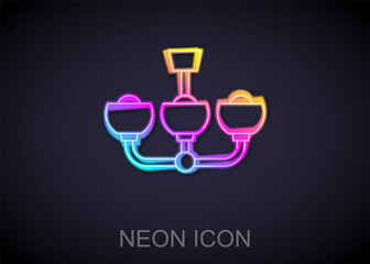 Glowing neon line Chandelier icon isolated on black background. Vector.