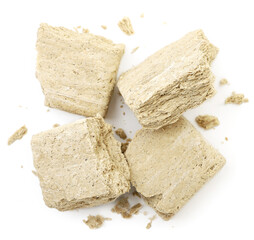 Halva pieces on white background, isolated. The view from top