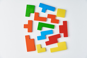 Fototapeta na wymiar Different wooden blocks on white background. Concept of logical thinking and education