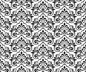 Floral pattern. Vintage wallpaper in the Baroque style. Seamless vector background. White and black ornament for fabric, wallpaper, packaging. Ornate Damask flower ornament