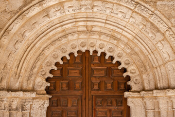 portal with archivolts and chamfered chambrane, Parish Church of San Bartolomé, Campisábalos,...