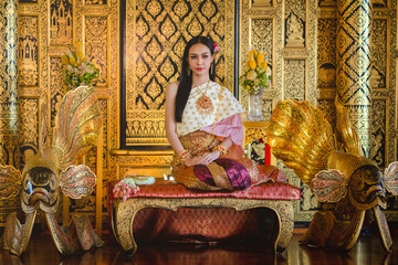 Obraz premium Luxury portrait of a beautiful Thai girl in traditional thai costume, identity culture of Thailand, identity culture of Asia