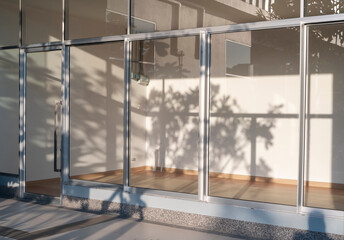 light and shadow from sunlight on wall . Modern building interior background..