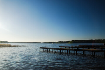 Fototapeta na wymiar Lake in Podlaskie Voivodeship, blue sky and clean water