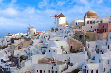 Panoramic view of Oia town at sunset, Santorini island, Cyclades, Greece
