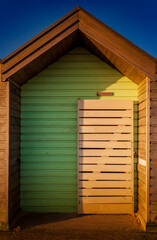 Colorful vibrant beach hut on the seafront. Blyth, Northumberland, UK. British tourism destination.