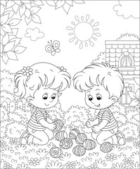 Happy little kids collecting decorated eggs after an Easter egg hunt on grass of a spring lawn, among bushes and trees in a garden of their house, black and white outline vector cartoon illustration