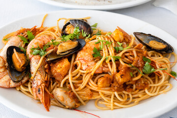 Pasta with grilled seafood. Traditional Greek dish.