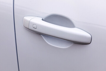 Door handle of new white car