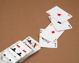 Poker playing cards. Poker set with isolated cards on brown background. Poker playing cards, full deck. Classic design of playing cards poker Games.