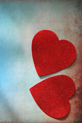 Red hearts for Valentine's Day on the grunge background. Valentine and love concepts.