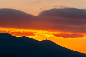 Clouds stretching across the sky at sunset