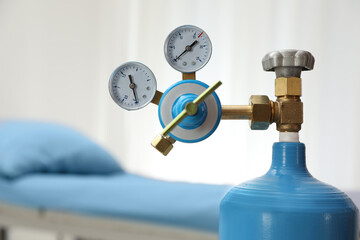 Medical oxygen tank in hospital room, closeup