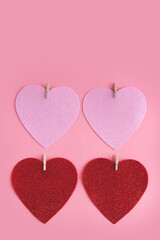 Pink hearts for Valentine's Day on the pink background. Valentine and love concepts.