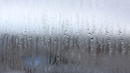 Horizontal background of condensation on transparent glass with high humidity
