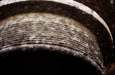 FRAGMENT of rusty lantern with cobwebs and corrosion