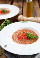 Tomato soup with red pepper and herbs