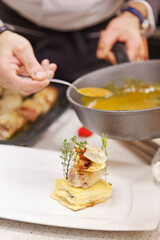 italian chef making gourmet dish