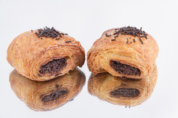 Closeup of Pain au chocolat isolated on a white background