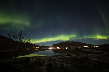 Aurora reflections in the fjord 
