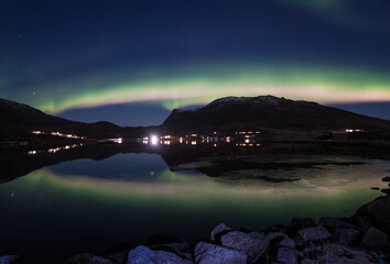 Aurora reflections in the fjord 