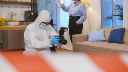 Forensic expert at crime scene doing investigation