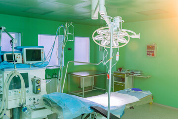 Interior of operating theatre with green walls for birthing of pregnant women, birth Surgery,...