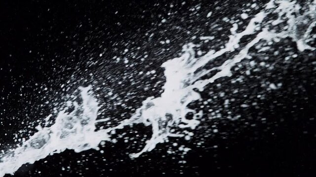 Super slow motion of Champagne splashes explosion with flying cork. Filmed on high speed cinema camera, 1000 fps