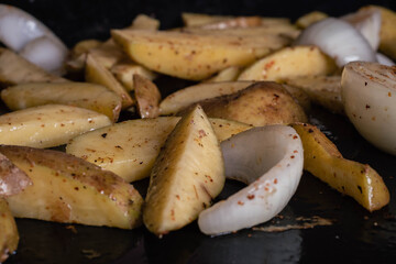 steel grilled meat burger with wood flame fries in metallic foil herbs oregano onions cordoba argentina