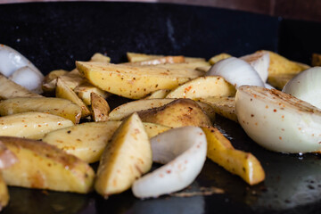 steel grilled meat burger with wood flame fries in metallic foil herbs oregano onions cordoba argentina