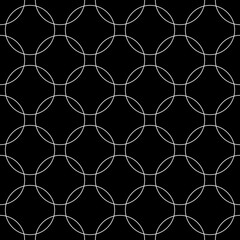 Fototapeta premium Seamless abstract intersecting and repeating modern colorful circles. Black and white