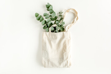Eco bag with eucalyptus on white background