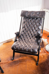 brown chester or chesterfield style armchair with buttons on animal skin cordoba argentina