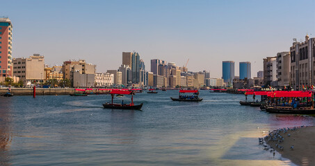 Abra water taxis criss-cross the Dubai Creek in the UAE in springtime