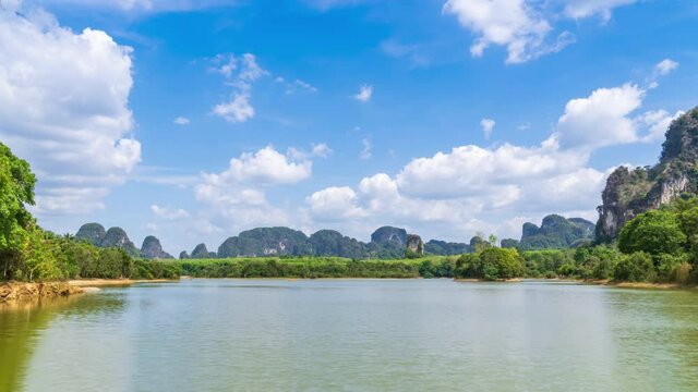Nong Thale, peaceful lake in Krabi, famous tourist destination for photography during sunrise; zoom in - Time Lapse