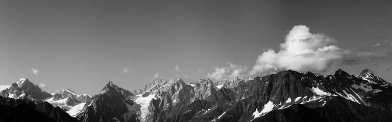 Fototapeta na wymiar Panorama of high rocky mountains with glacier