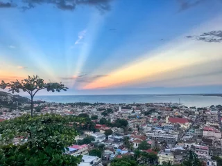 Foto op Canvas Panoramic View of Cap-Haitien, Haiti with an Awesome Sunset Sky © Rotorhead 30A