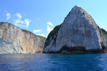 Fototapeta premium Rocky Mountain with a blue sky and amazing sea