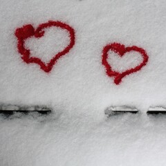 red hearts in the snow