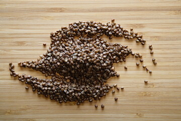Buckwheat seeds on a bamboo board