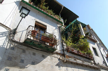 View of the streets and old buildings of Granada, historic city of Andalusia (Spain). 
