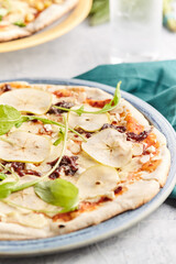 Homemade stone and mold pizzas with fresh vegetables and muzzarella
