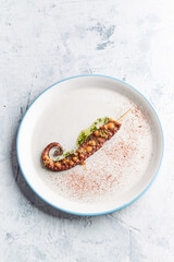 Barbecue octopus on wooden table