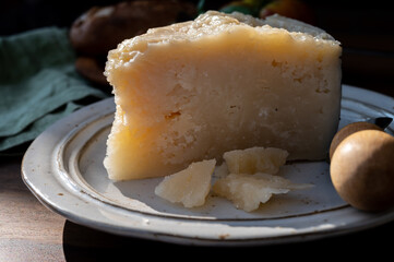 Cheese collection, aged hard Italian sheep cheese black pecorino from Sicily island or pecorino nero di Sicilia.