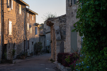 Old buildings and narrow streets in medieval town Villeneuve les Avignon in summer