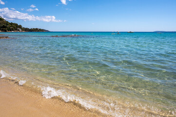 Summer vacation on French Riviera, crystal clear azure blue water of  Mediterranean sea in Saint Clair near Le Lavandou, Var, Provence, France